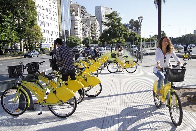 yellow-bikes-woman-riding-bike-public-transport-buenos-aires