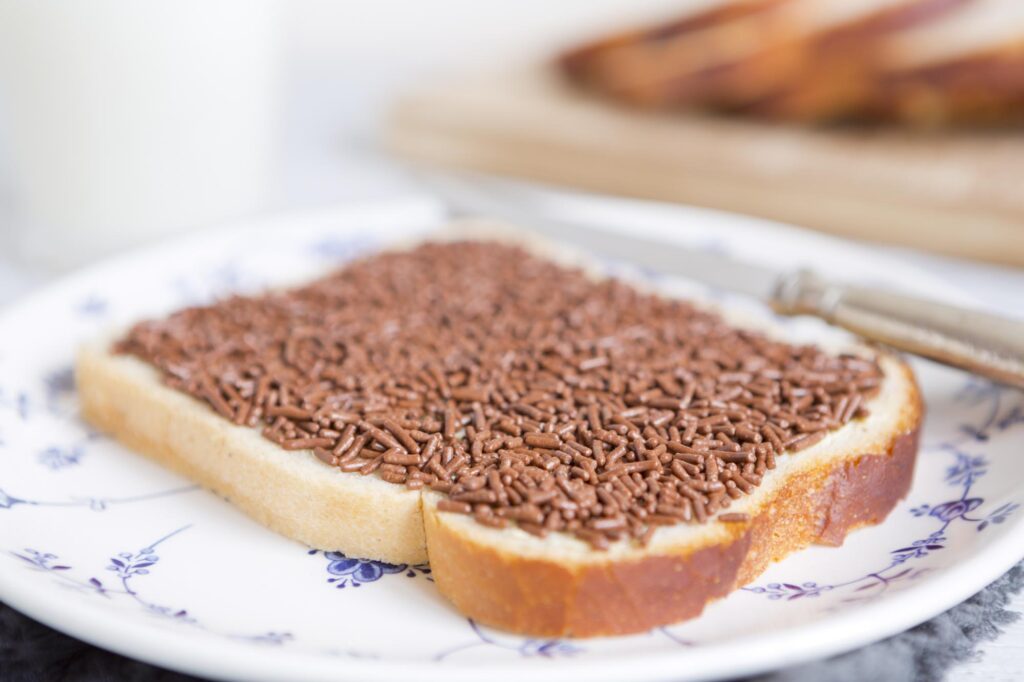 Chocolate hagelslag on bread is a Dutch breakfast