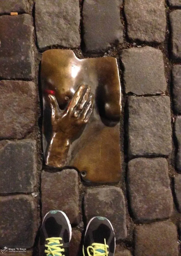 Iron breast on the ground in the Red Light District, Amsterdam.