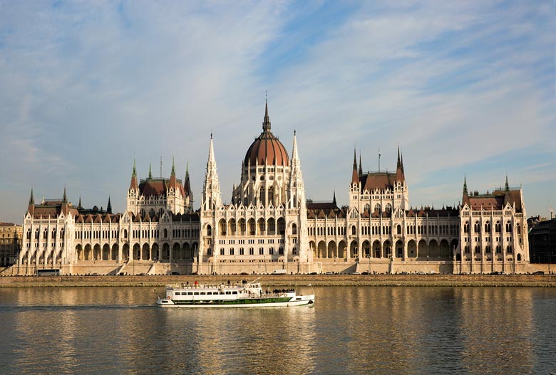 Building Hungarian parliament and boat cruising in the Danube river