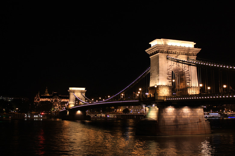 Chain Bridge lit up at night in Budapest