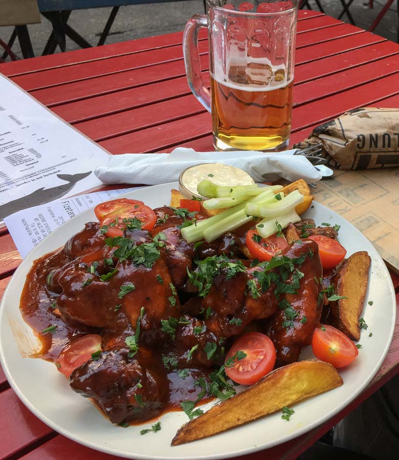 Potatoes and tomatoes dish at Kuplung ruin pub in Budapest
