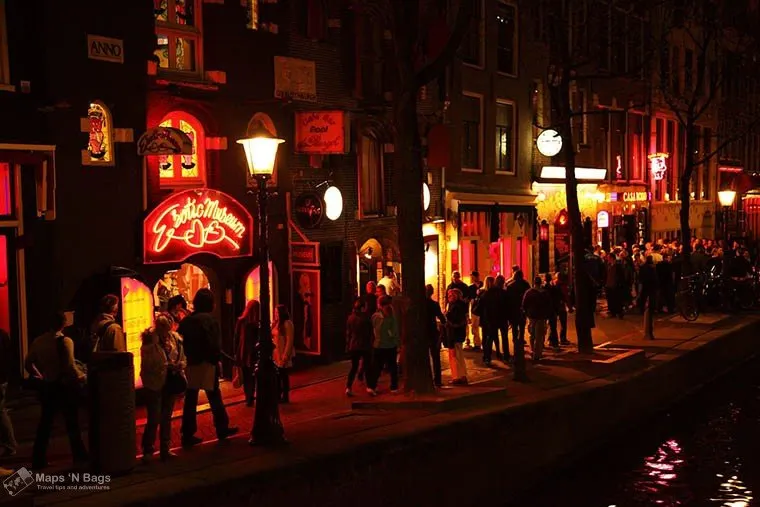 Busy street in the Red Light District in Amsterdam. Best travel tips for Amsterdam.