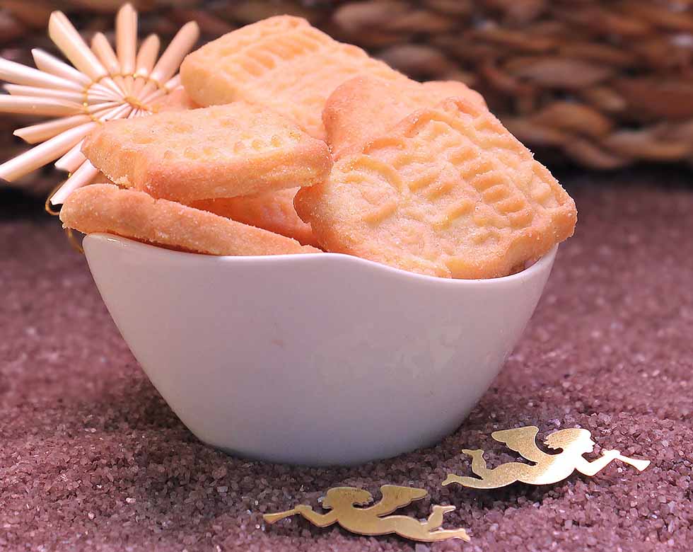 Speculaas cookies in a white bowl in Amsterdam.