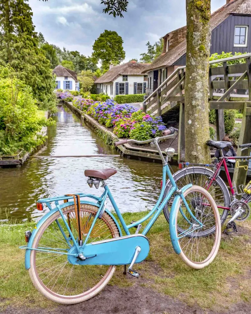 Blue bike near canal in Giethoorn, the Netherlands