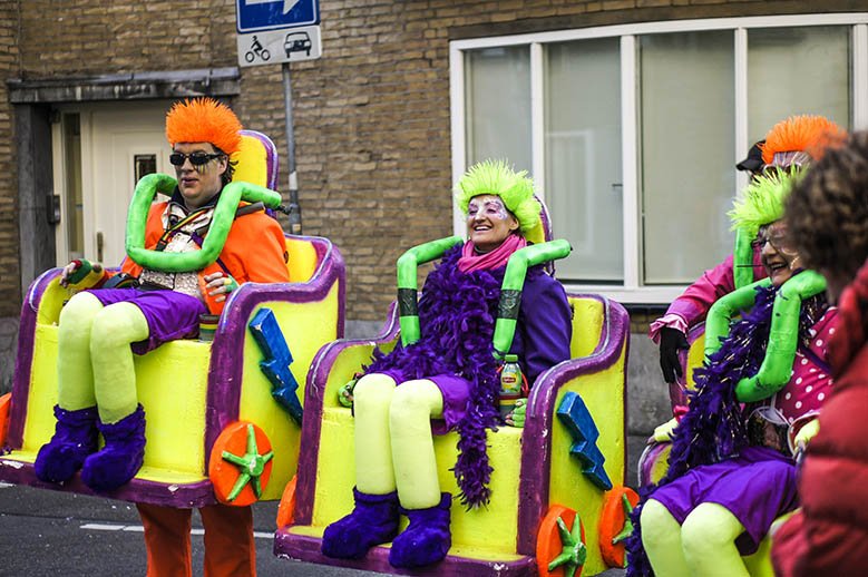 People wearing colorful costumes for carnival in Maastricht.