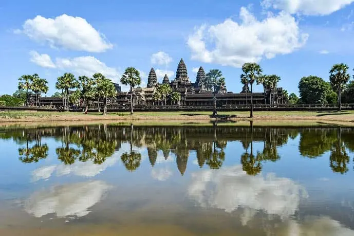 Angkor Wat in Cambodia. Water, blue sky and temple.