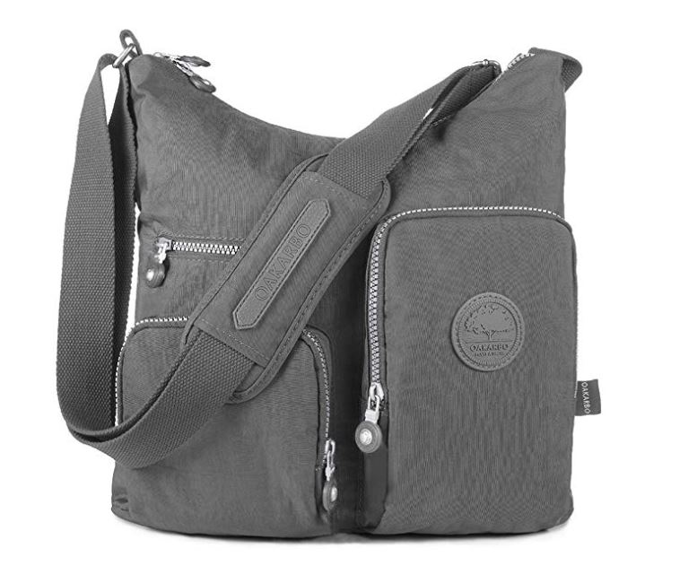 Gray crossbody bag for traveling in Europe.