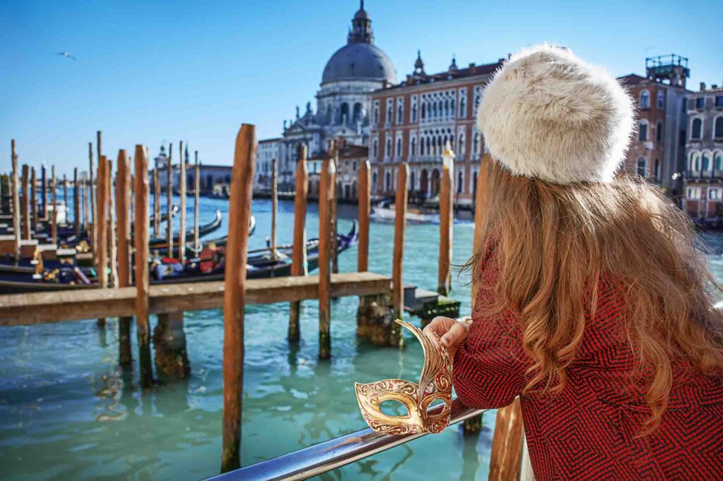 woman in fur hat in Venice, Italy