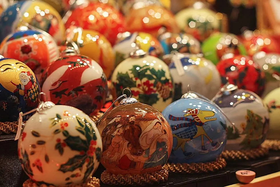 Many Christmas balls painted in different colors.