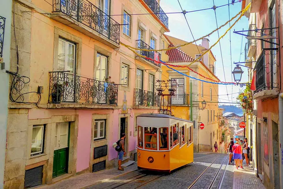 Yellow tram (ascensor da bica) in Lisbon #Portugal #travel #Europe