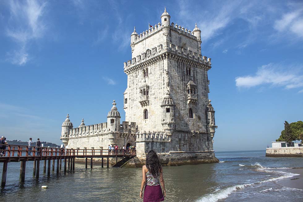 Brunette looking at the Belem Tower in Lisbon #Portugal #Europe #Travel