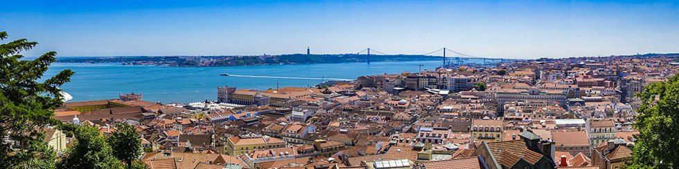 Panoramic view over houses and the Tagus River in Lisbon #Portugal #travel #Europe