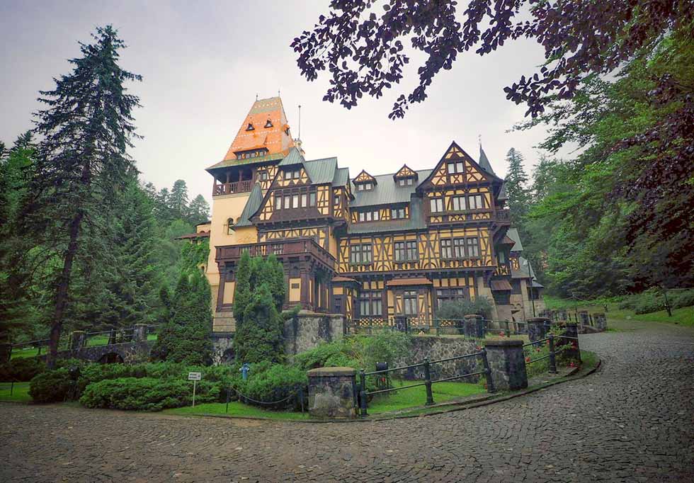 Yellow and brown Pelisor Castle in Sinaia, Romania