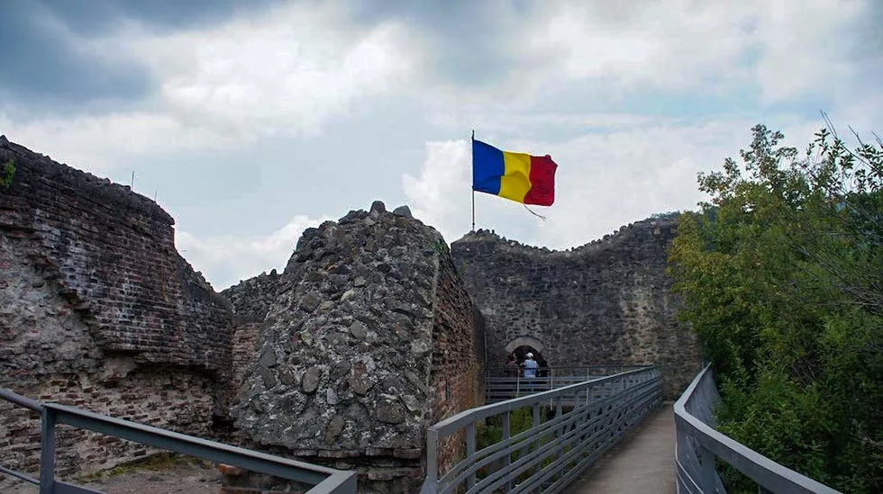 Romanian flag on the ruins of the Poenari Castle.