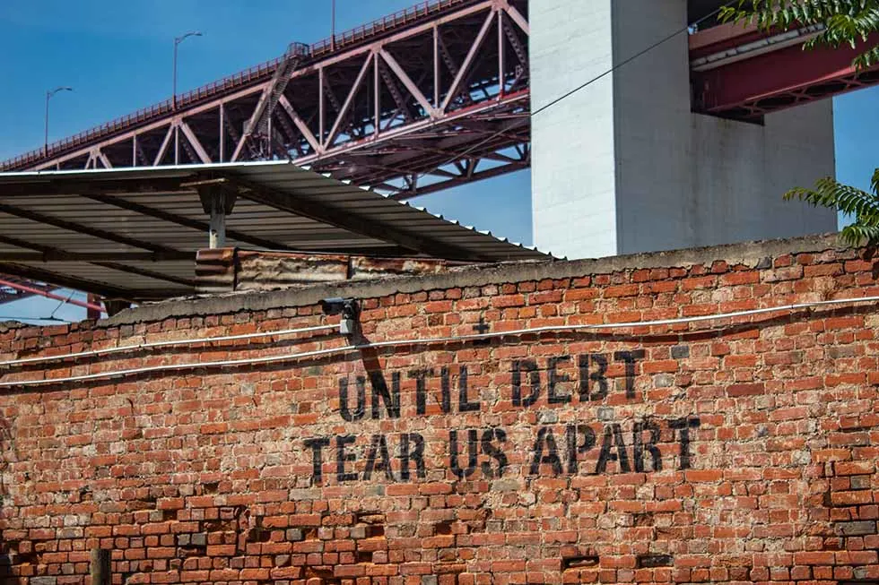 Until debt tear us apart mural at LX Factory in Lisbon #Portugal #Europe #Travel