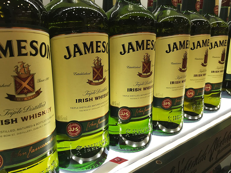 Bottles of Irish whiskey Jameson on a shelf