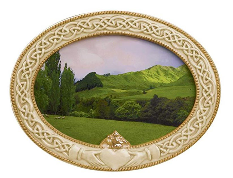 Green landscape image in a Celtic photo frame