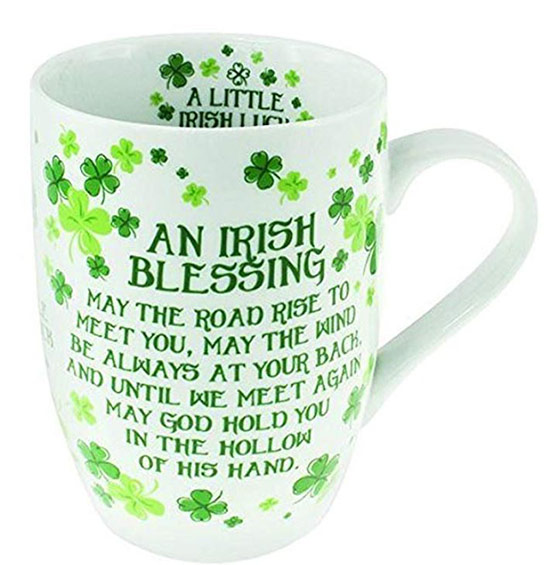 Irish blessing written in green on a white mug