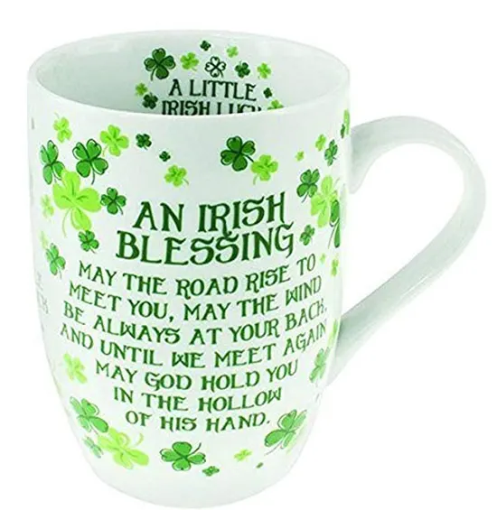 Irish blessing written in green on a white mug