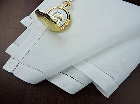 White handkerchief on a dark table