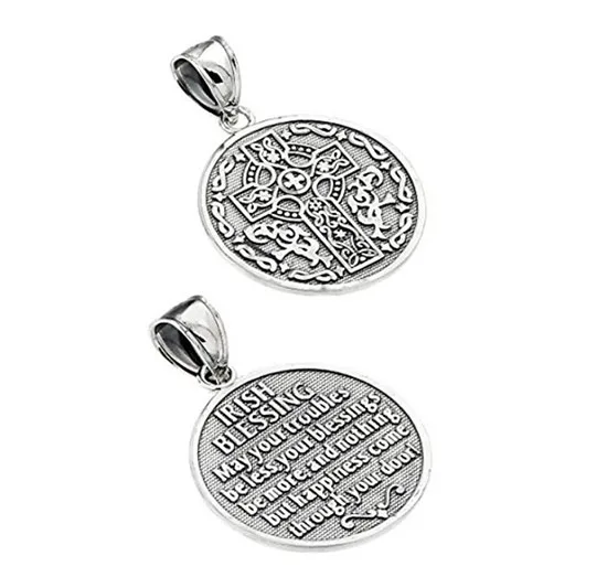 Two silver pendants with an Irish cross and blessing next to each other