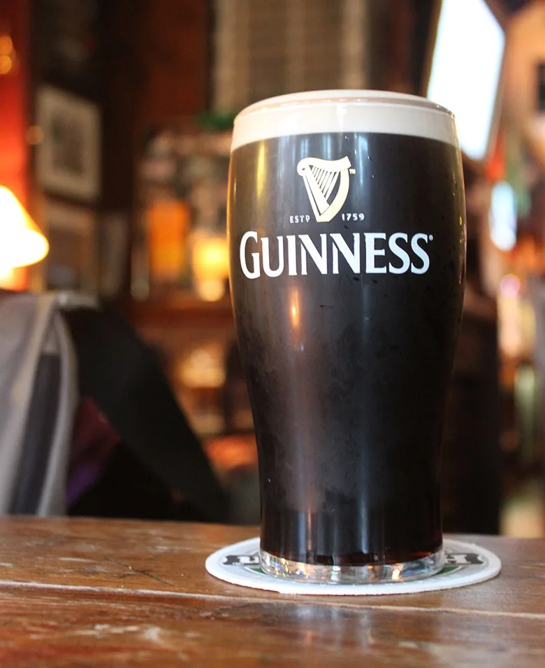 Glass of the dark Irish beer, Guinness