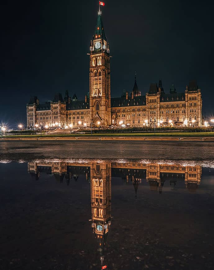 Canadian parliament lit up during the night