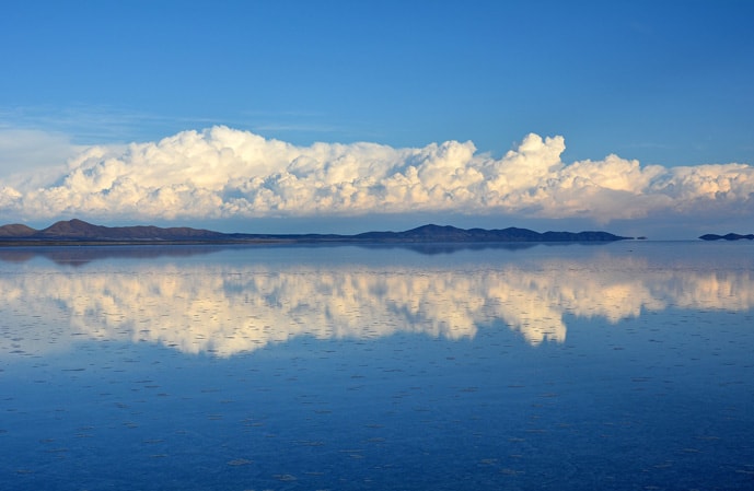 Sky's reflection on Bolivia salt flats tours