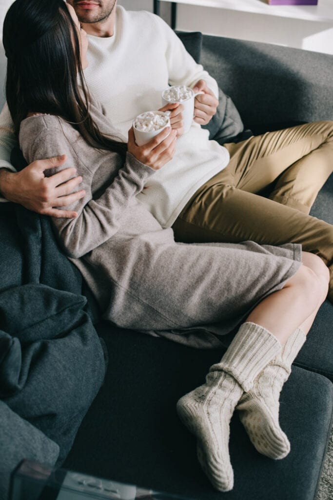 Couple cozy in the couch