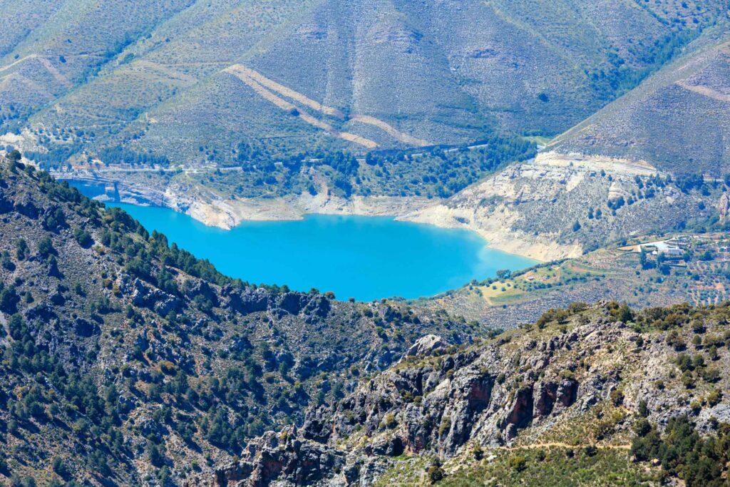 Blue lake in Sierra Nevada National Park, near Granada, Spain