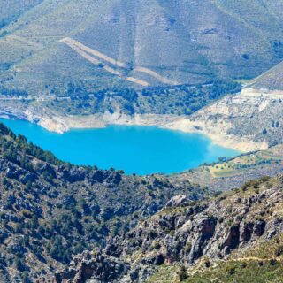 Blue lake in Sierra Nevada National Park, near Granada, Spain