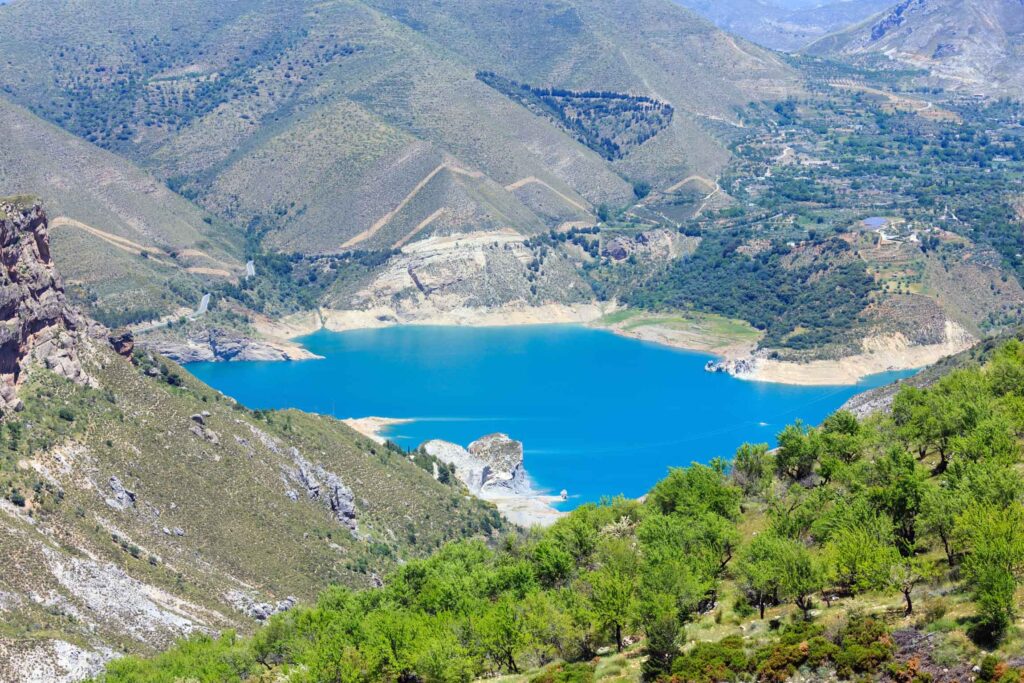 Blue lake in Sierra Nevada National Park, near Granada, Spain