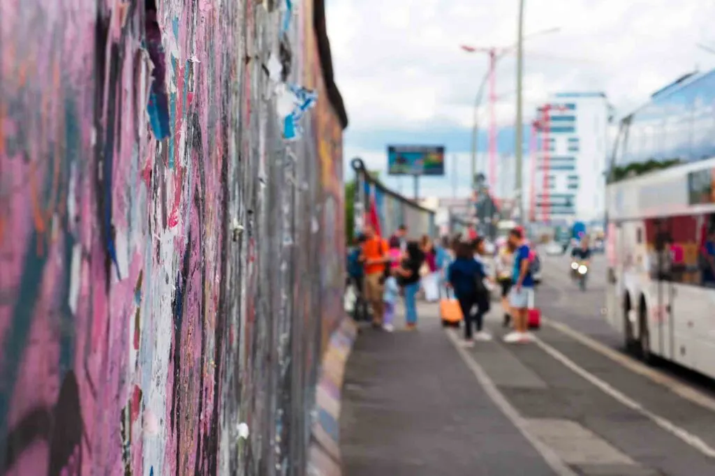 Tourists at the East Side Gallery on Berlin Wall, Germany