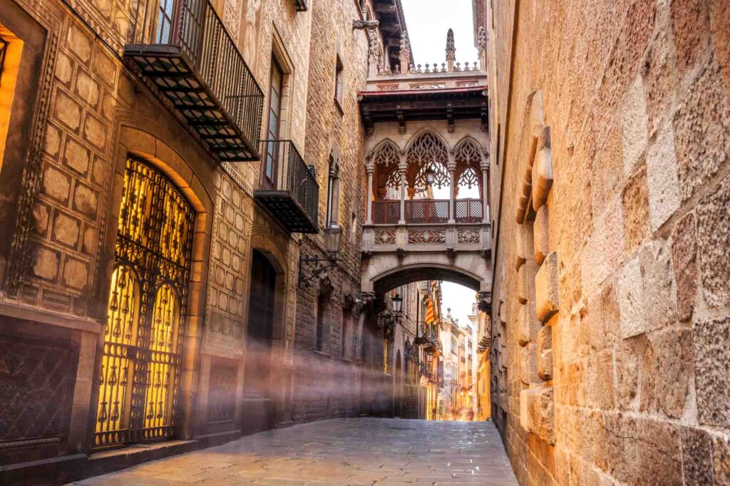 Bridge between buildings in Barri Gotic quarter of Barcelona, Spain