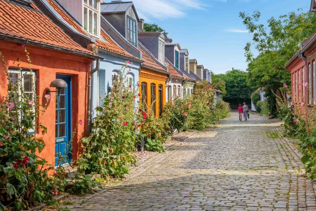 Colorful old cottages on a quiet street in Aarhus, Denmark