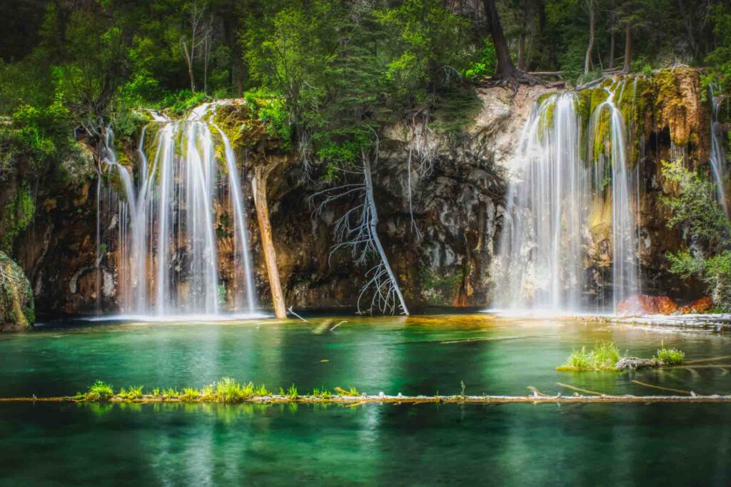 Waterfalls and clear green water at Hanging Lake, Glenwood Canyon, Colorado